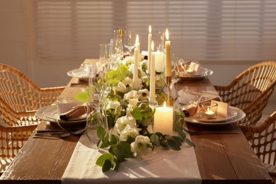 Festive table setting with beautiful tableware and decor indoors