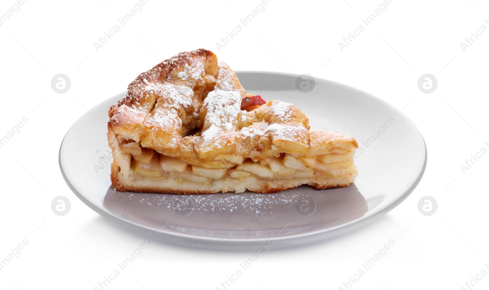 Photo of Slice of traditional apple pie with sugar powder on white