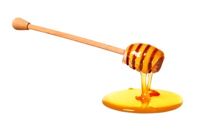 Image of Natural honey dripping from dipper on white background