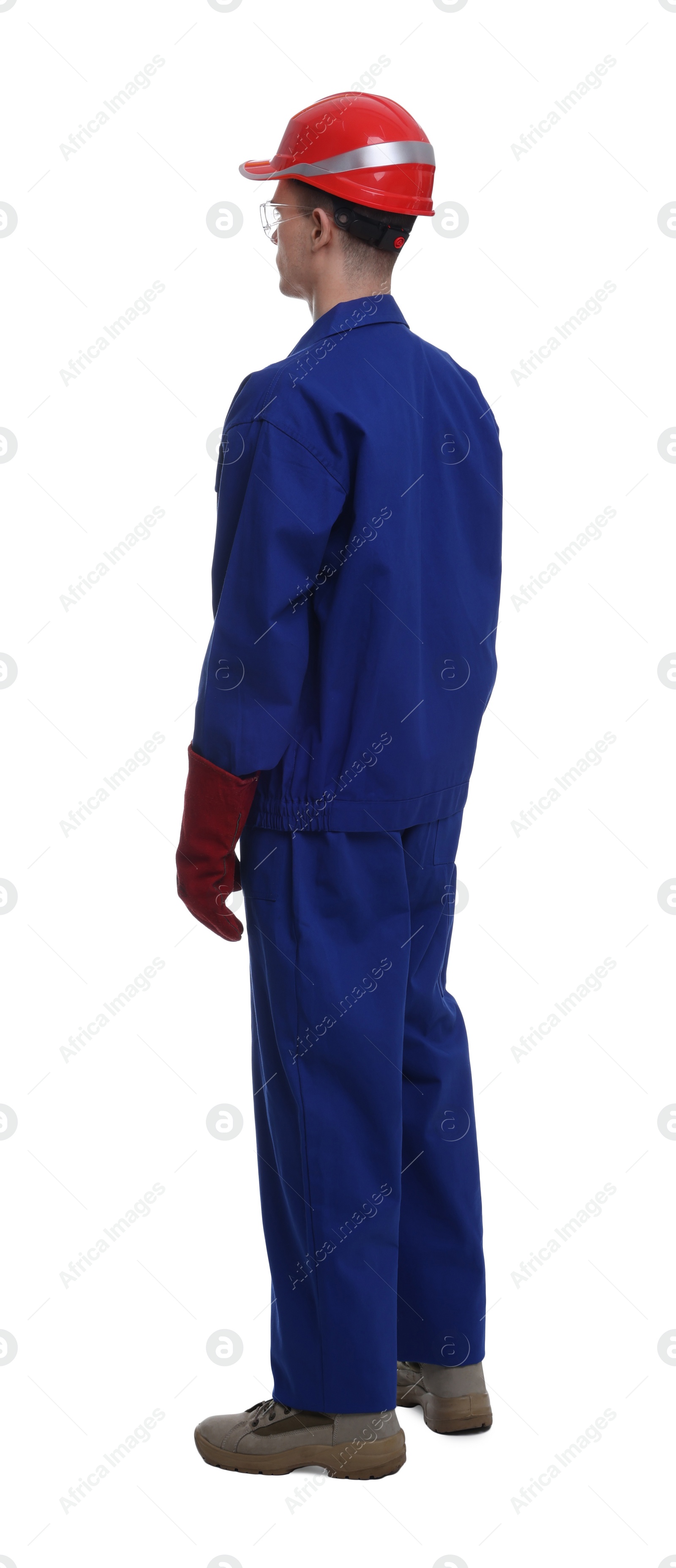 Photo of Young man wearing safety equipment on white background, back view