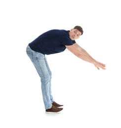 Photo of Emotional man in casual clothes posing on white background