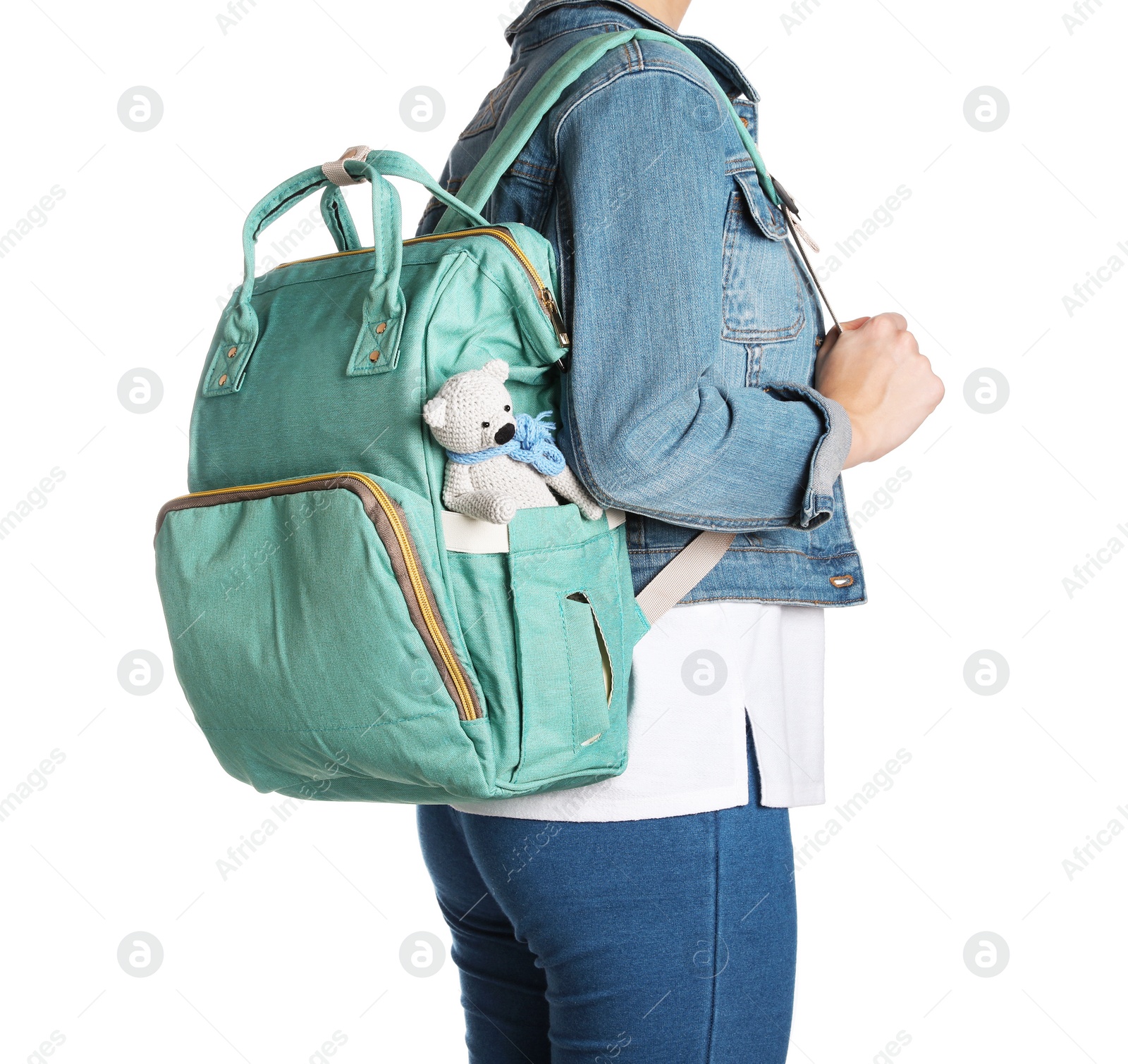 Photo of Woman with maternity backpack for baby accessories on white background, closeup