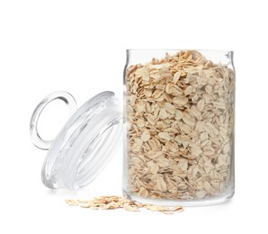 Photo of Raw oatmeal and glass jar on white background