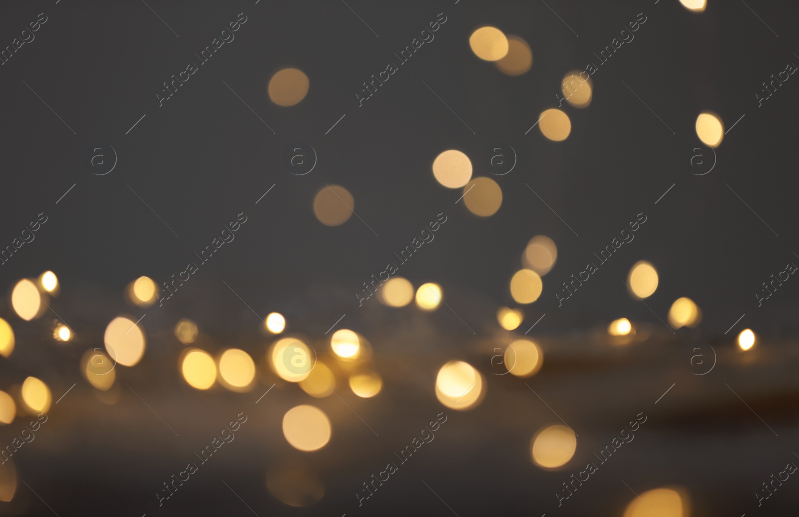 Photo of Beautiful lights on dark background. Bokeh effect