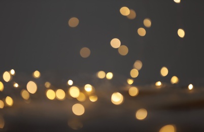 Photo of Beautiful lights on dark background. Bokeh effect