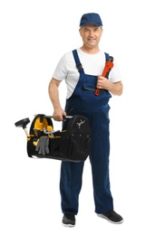 Mature plumber with tool bag on white background