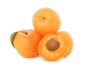Photo of Delicious ripe sweet apricots isolated on white
