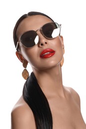 Attractive woman in fashionable sunglasses on white background