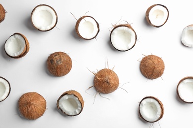 Photo of Coconut pattern on white background, top view