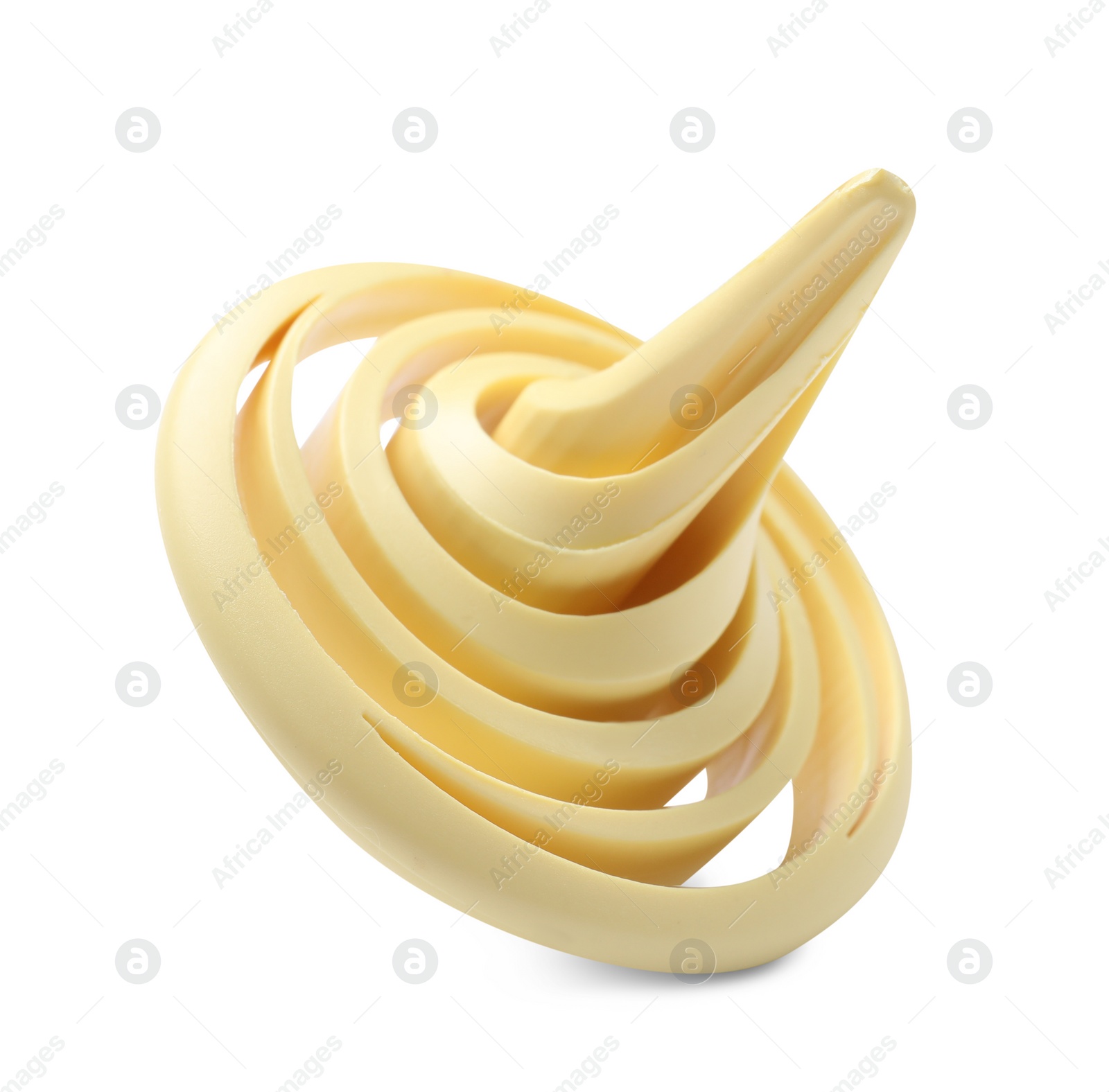 Photo of One pale yellow spinning top on white background