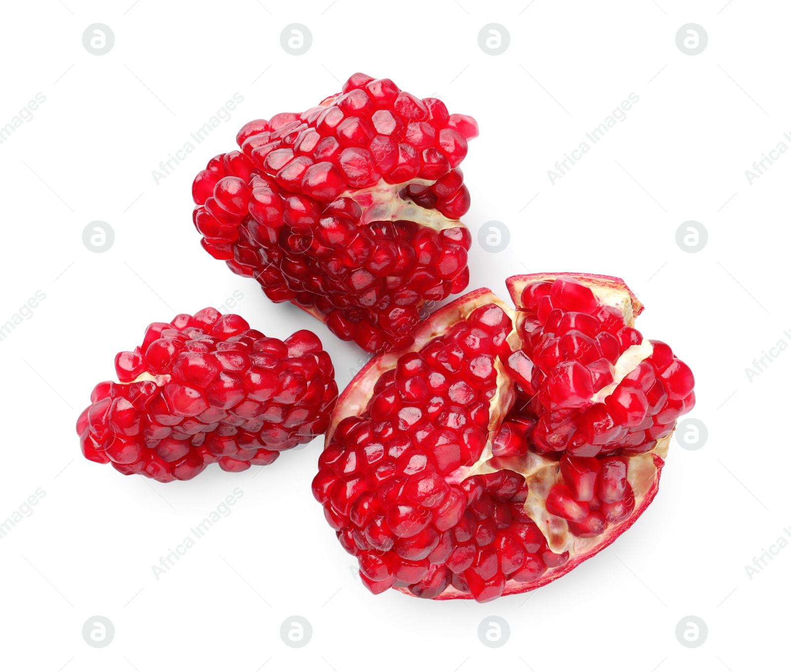 Photo of Fresh cut pomegranate isolated on white, top view