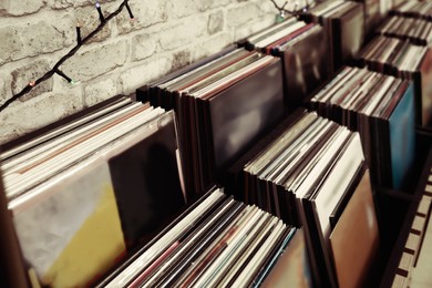 Rack with different vinyl records in store