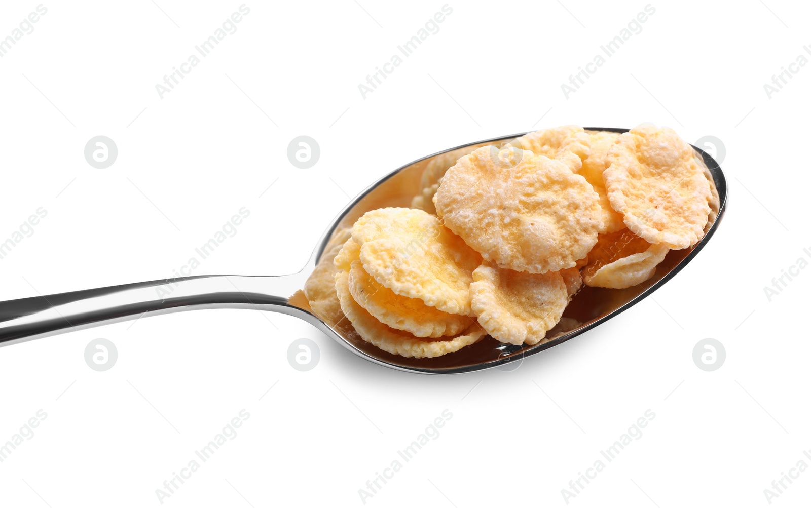 Photo of Metal spoon of tasty crispy corn flakes on white background