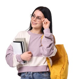 Smiling student with notebooks and backpack on white background