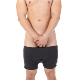 Photo of Young man with urological problems on white background