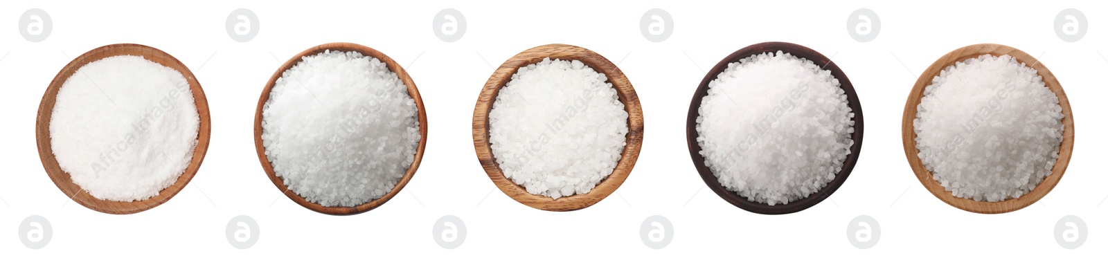 Image of Set of natural salt in bowls isolated on white, top view