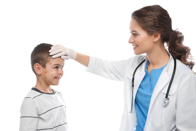 Doctor examining little boy with chickenpox on white background. Varicella zoster virus