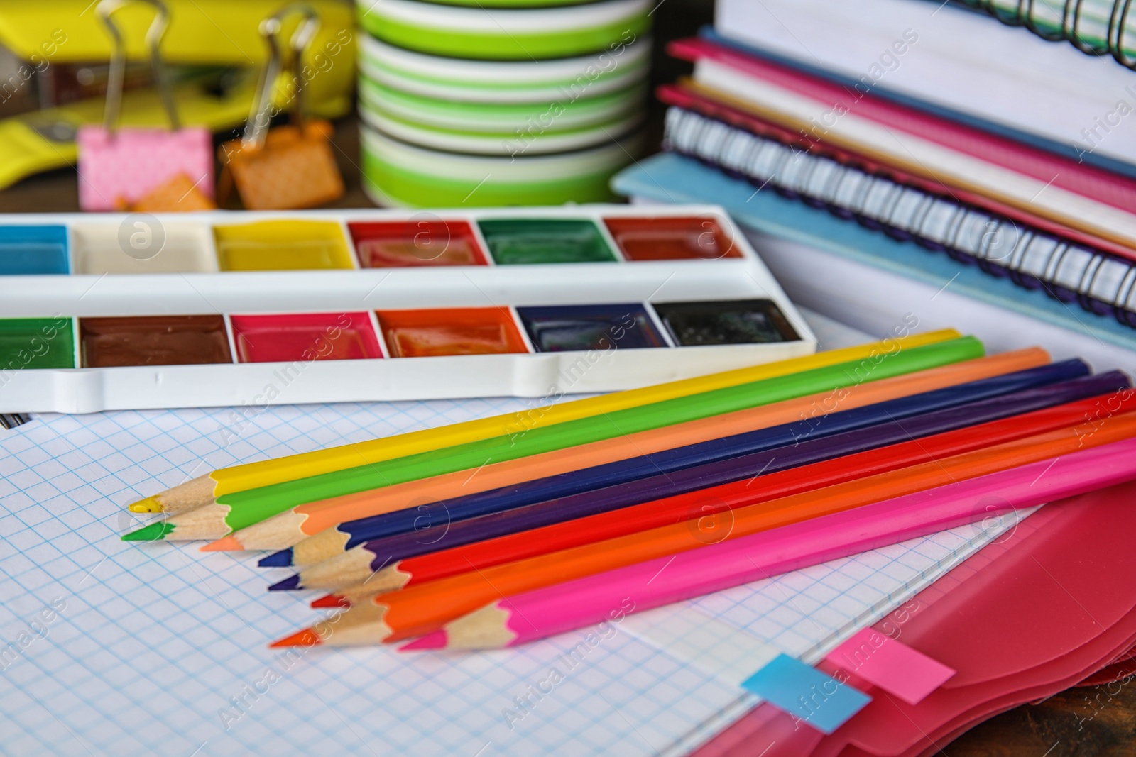 Photo of Different colorful stationery, close up. Back to school