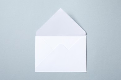 Photo of Letter envelope on grey background, top view