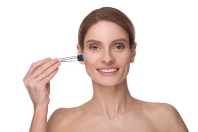 Woman with makeup brush on white background