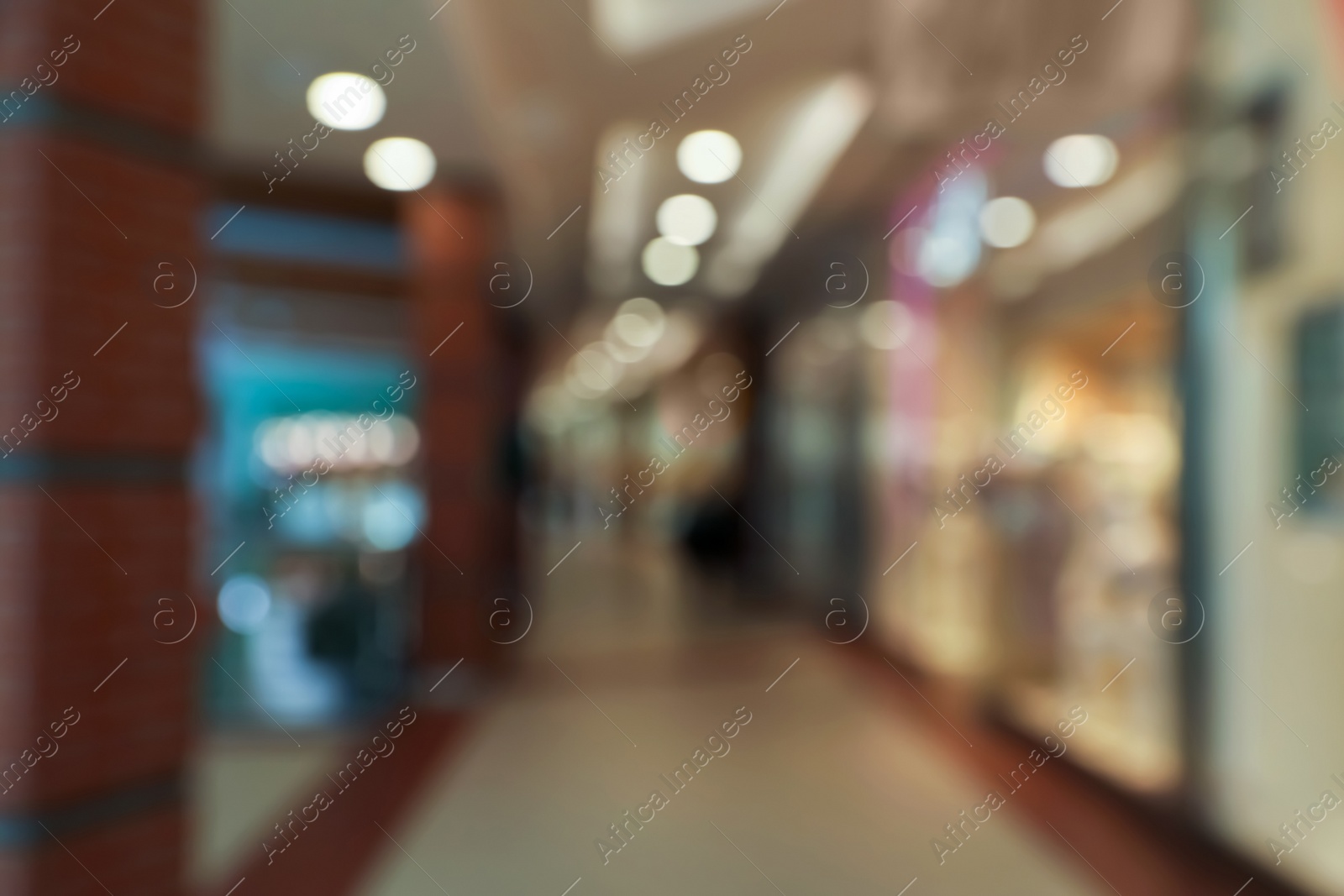 Photo of Blurred view of shopping mall interior. Bokeh effect