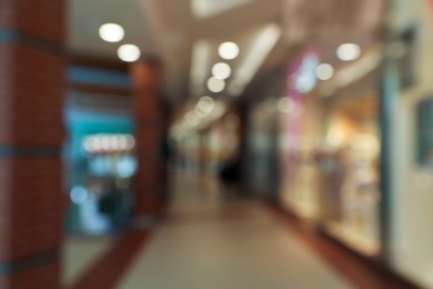 Photo of Blurred view of shopping mall interior. Bokeh effect