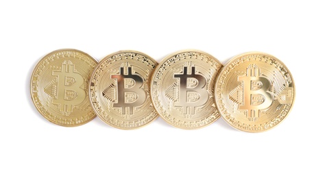 Row of bitcoins isolated on white, top view. Digital currency