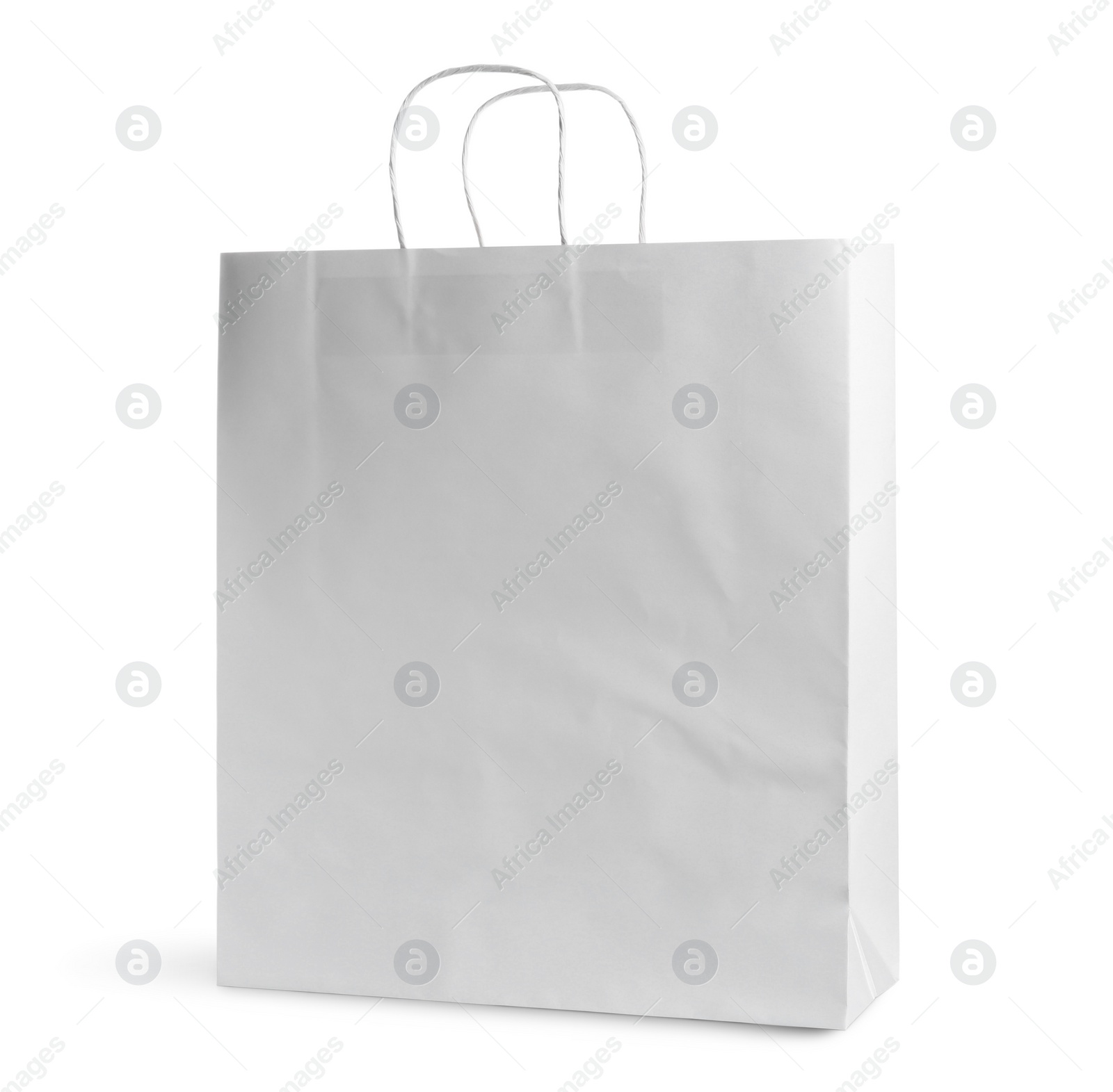 Photo of One paper bag isolated on white. Mockup for design