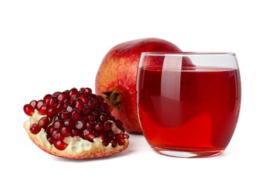 Photo of Refreshing pomegranate juice in glass and fruits isolated on white