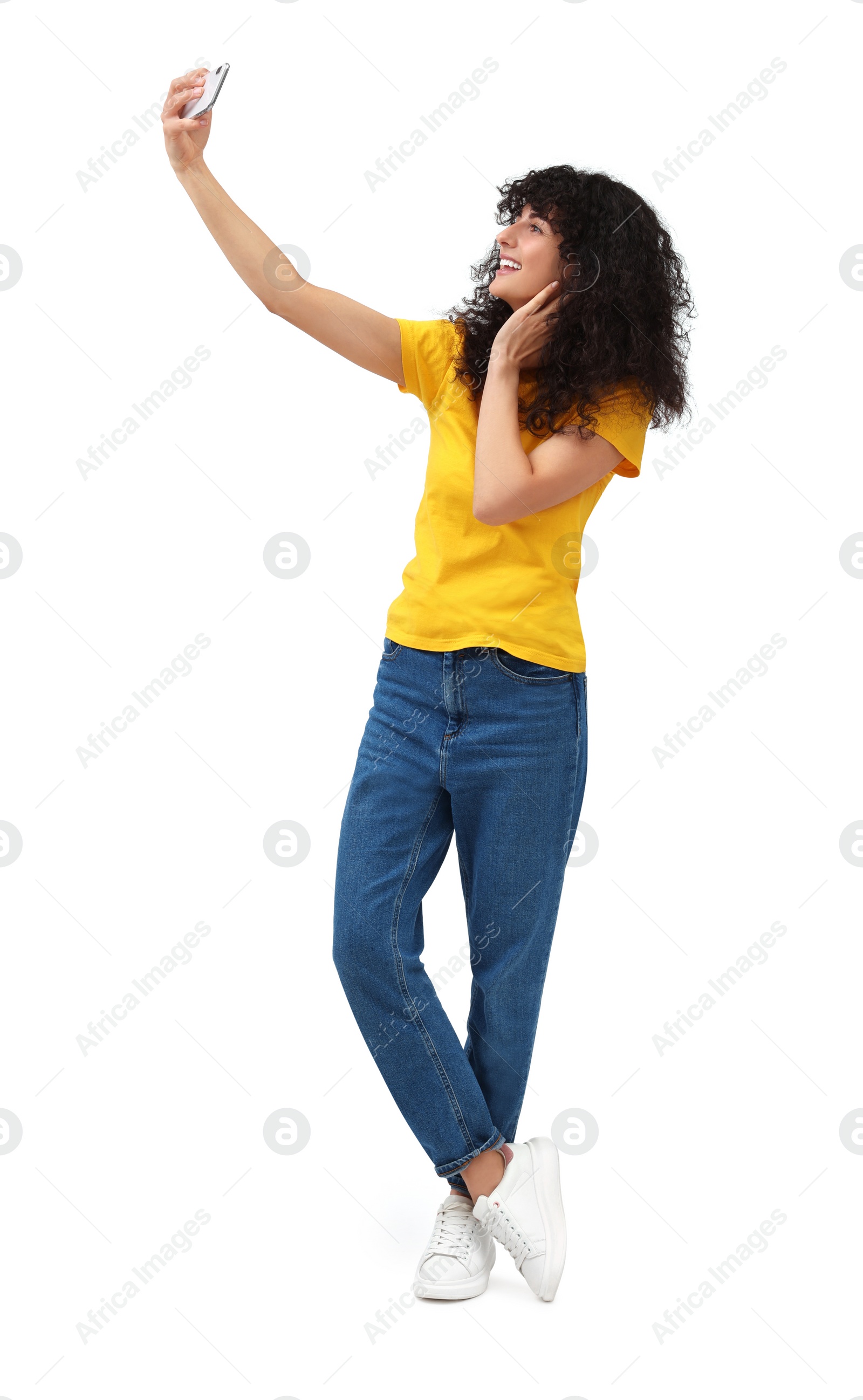 Photo of Beautiful young woman taking selfie on white background