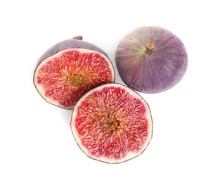 Whole and cut fresh figs isolated on white, top view