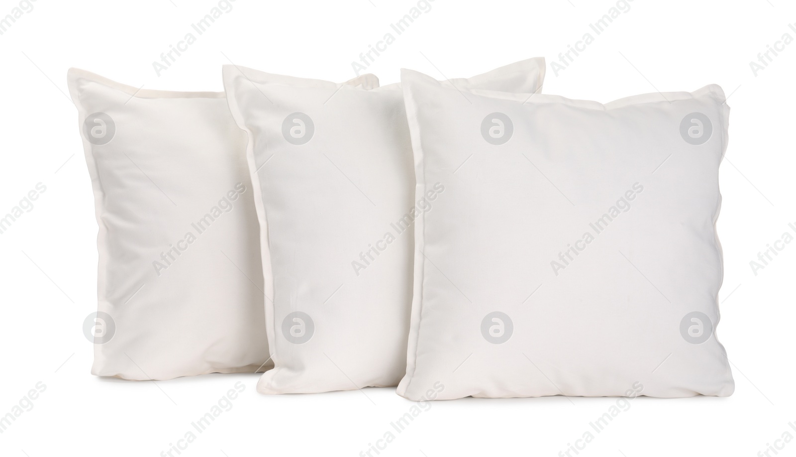 Photo of Many new soft pillows isolated on white