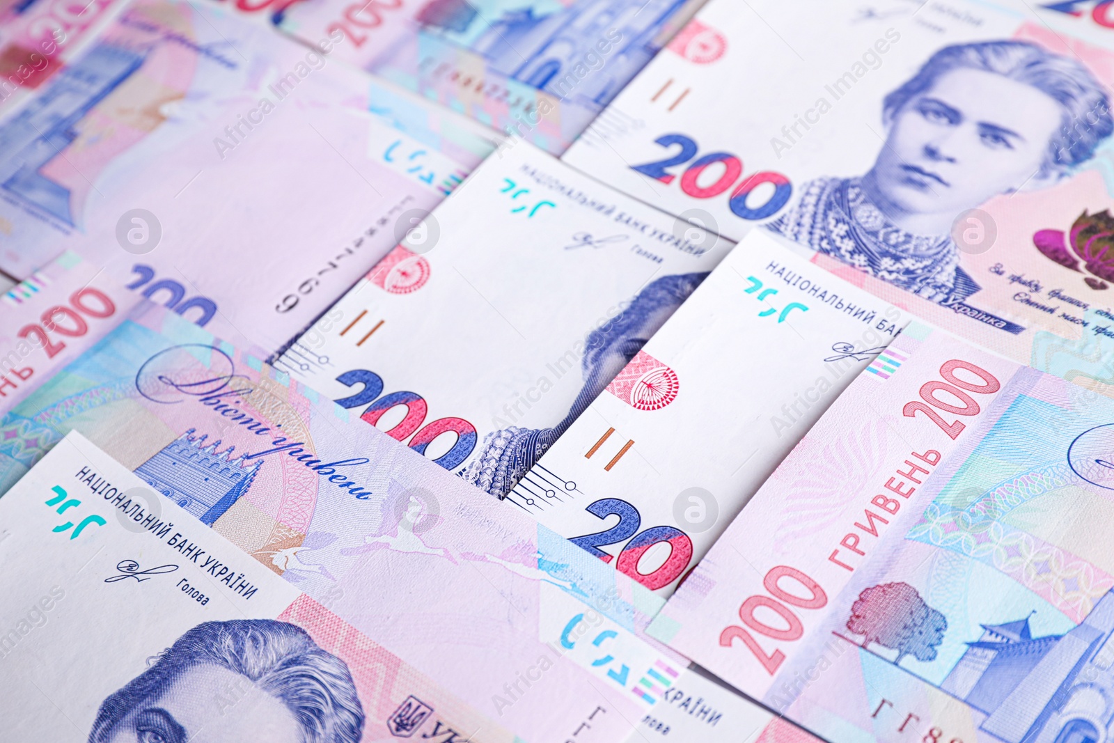 Photo of Closeup view of Ukrainian money as background. National currency