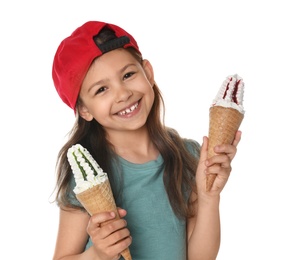 Photo of Adorable little girl with delicious ice creams on white background