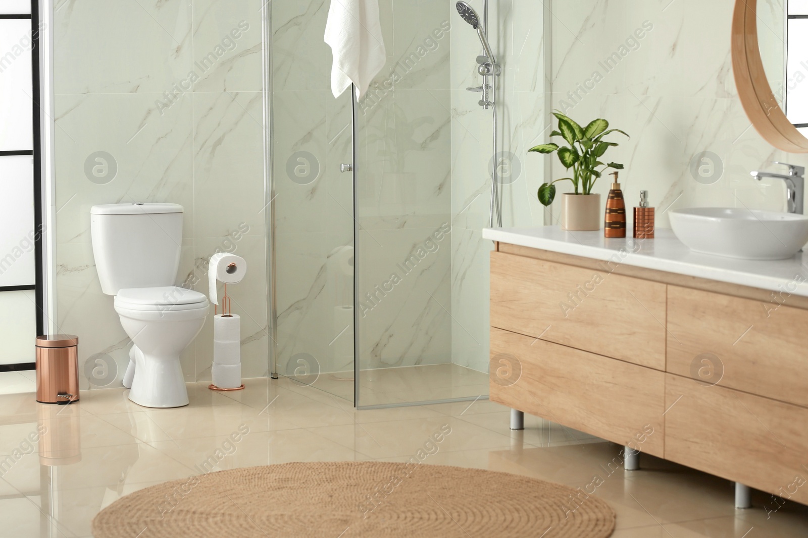 Photo of Interior of modern bathroom with toilet bowl