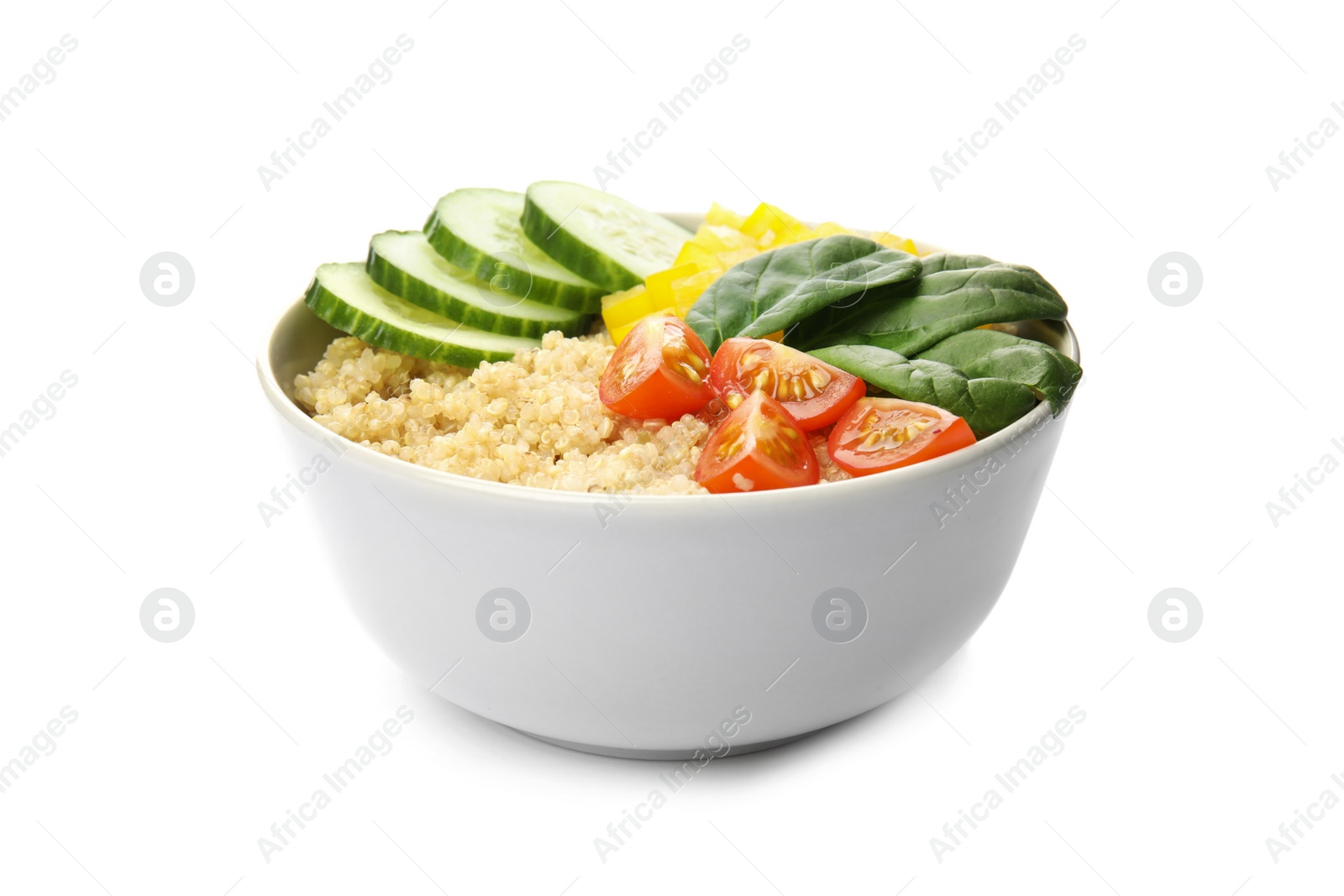 Photo of Healthy quinoa salad with vegetables in bowl isolated on white