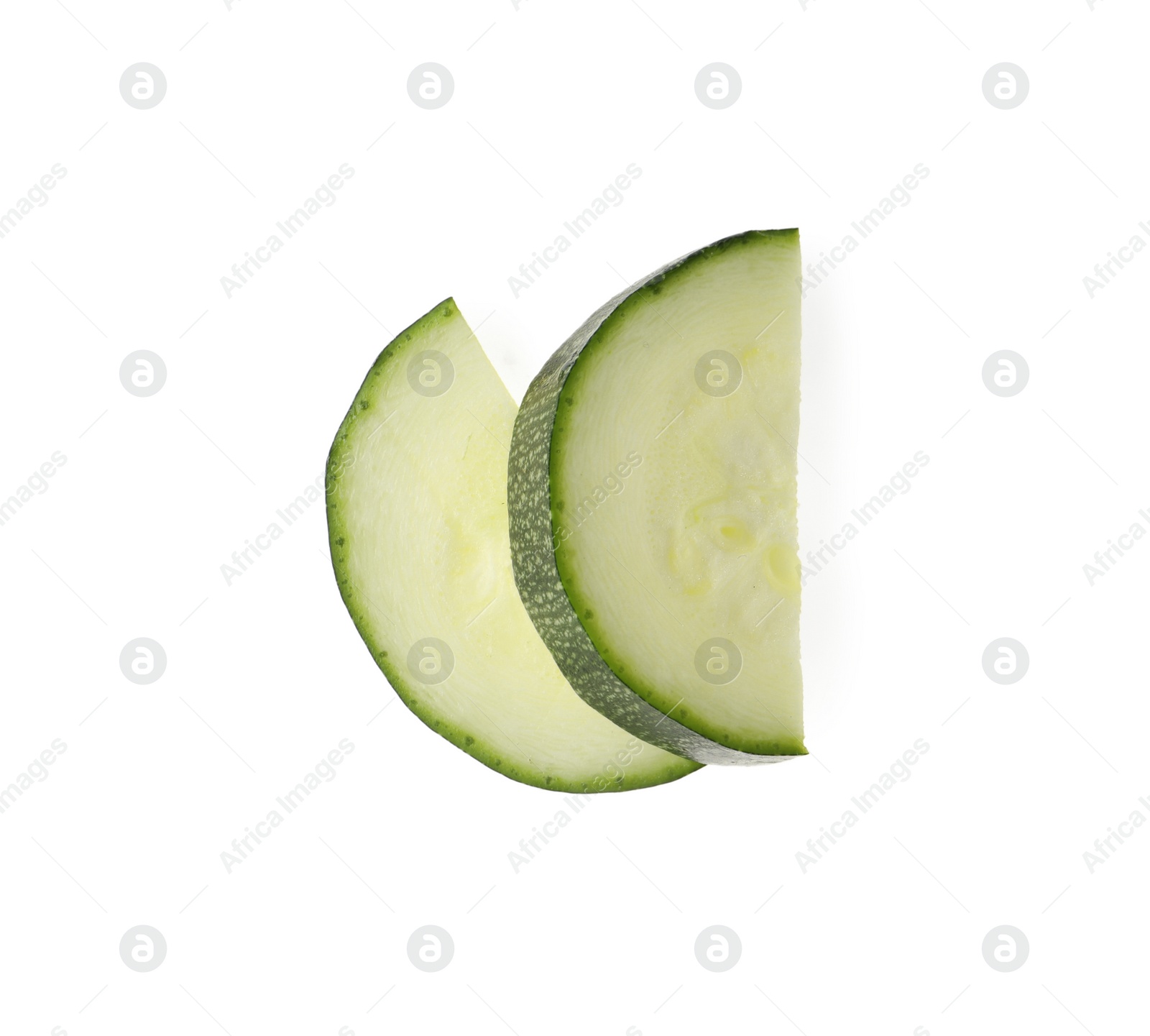 Photo of Slices of ripe zucchini on white background, top view