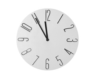 Photo of Clock showing five minutes until midnight on white background. New Year countdown