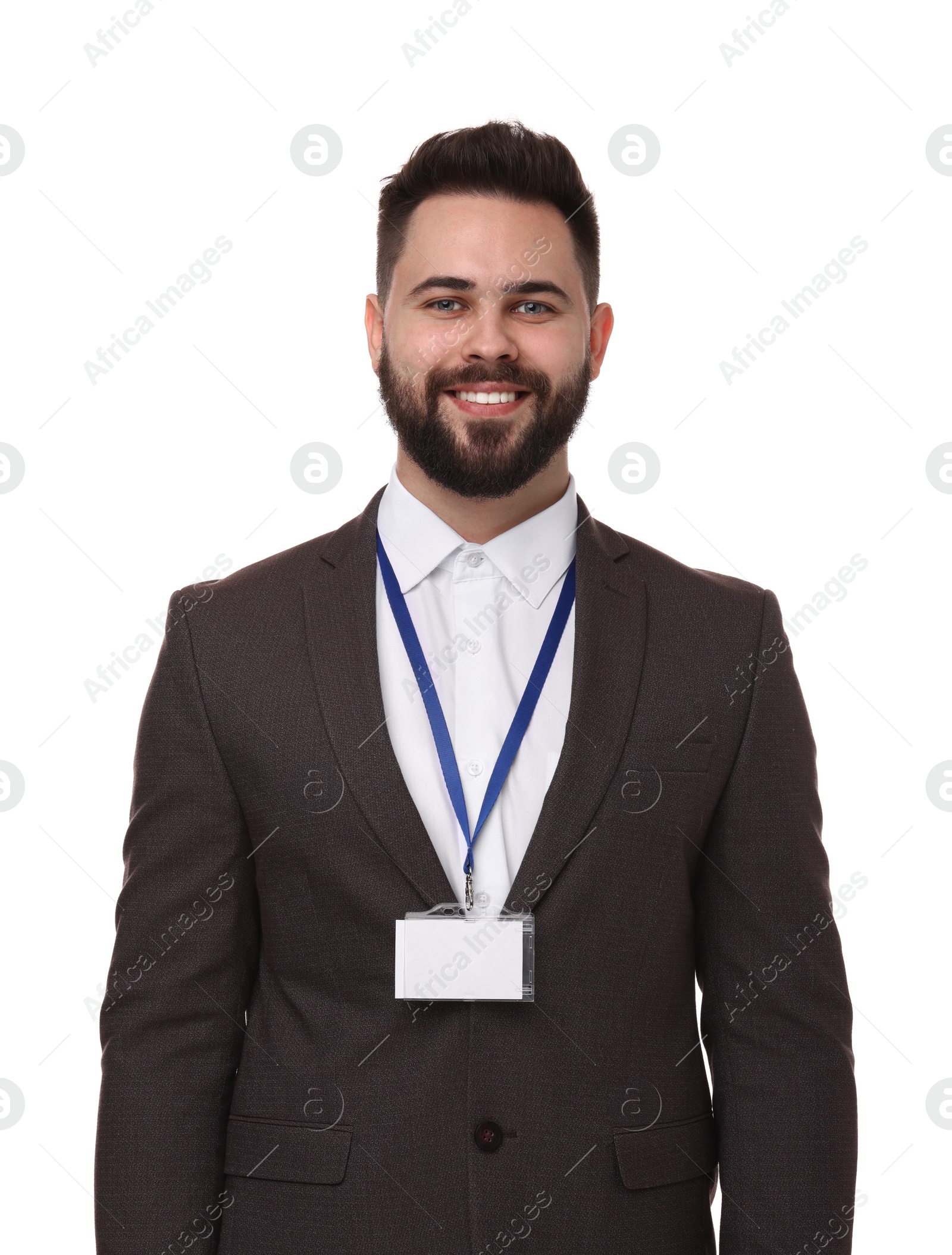 Photo of Happy young man with blank badge isolated on white