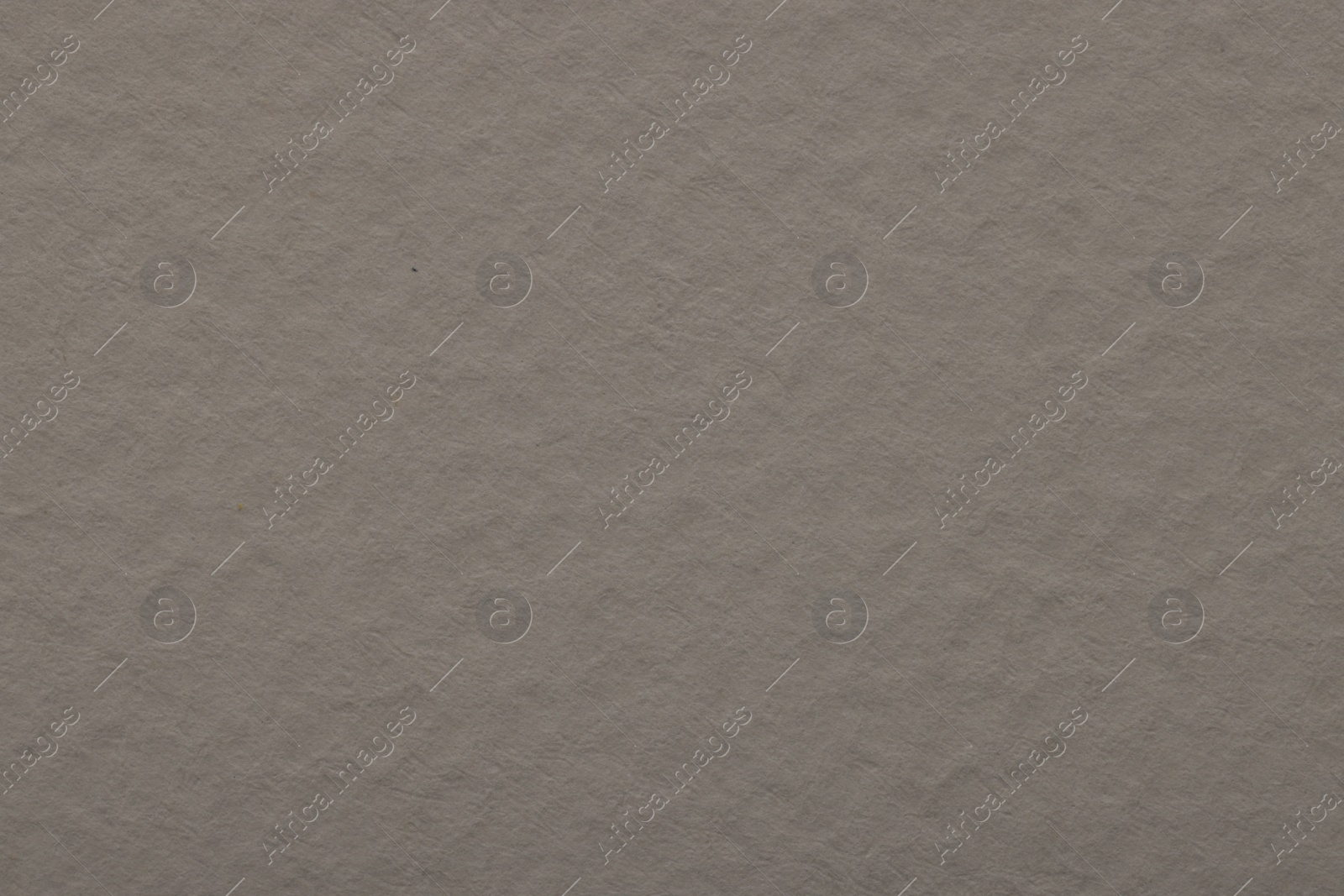 Photo of Texture of grey paper sheet as background, top view
