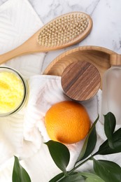 Flat lay composition with cosmetic products and fresh ingredients on white marble table. Anti cellulite treatment