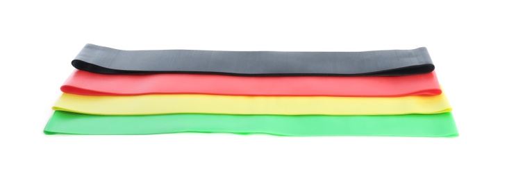 Photo of Set of fitness elastic bands on white background