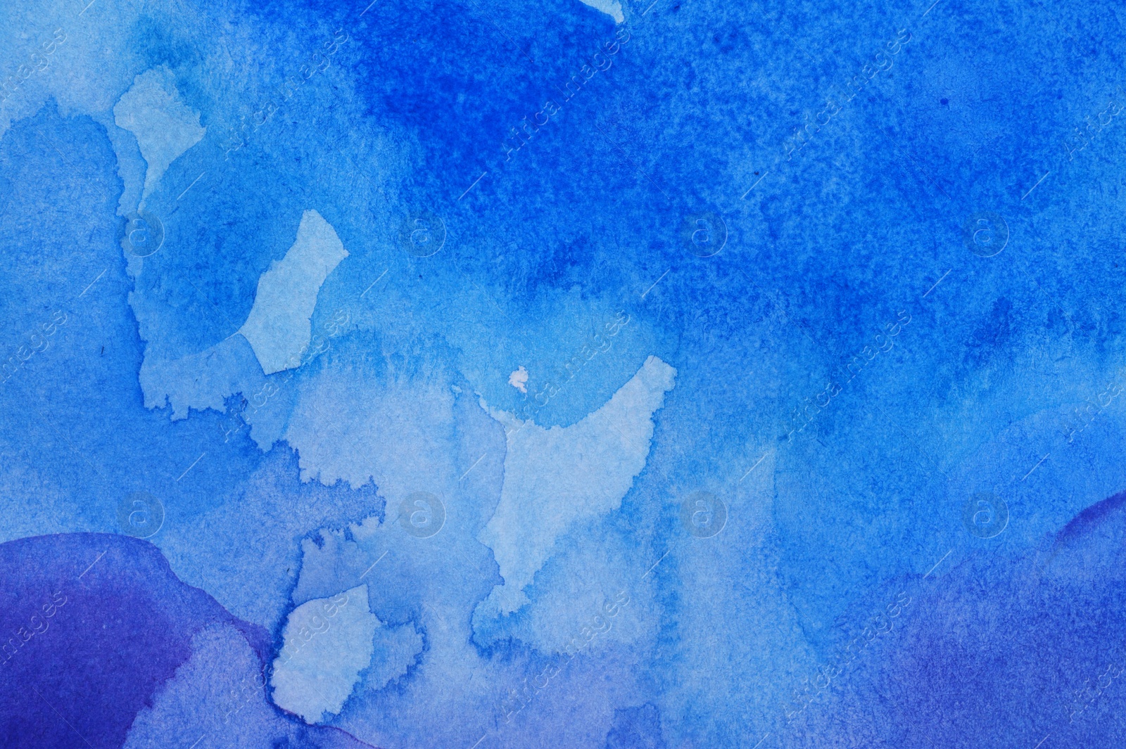 Photo of Abstract blue watercolor painting as background, top view