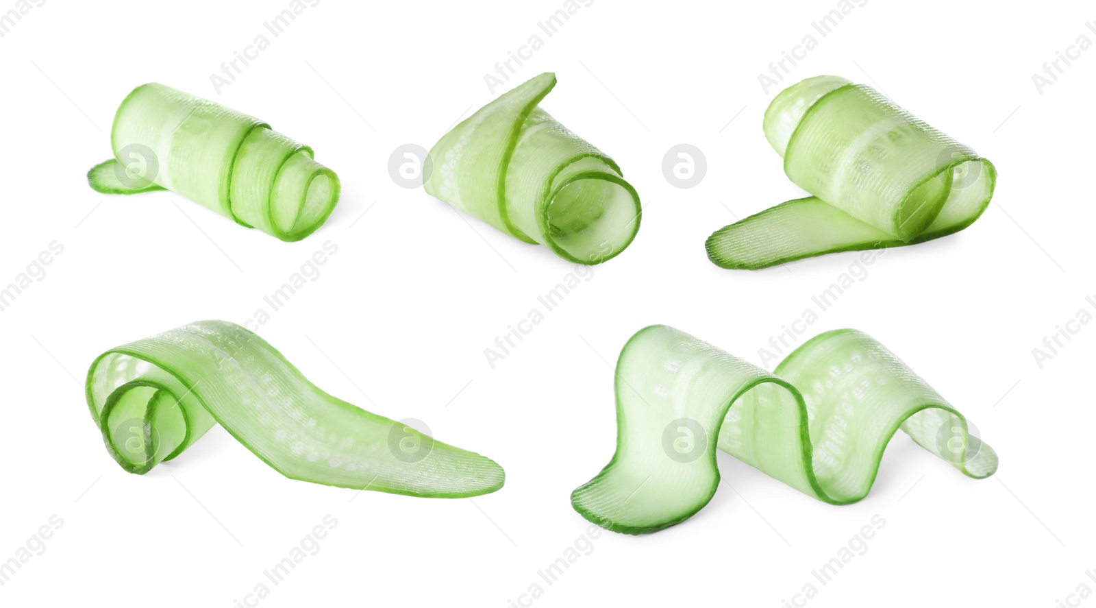 Image of Set with slices of cucumbers on white background
