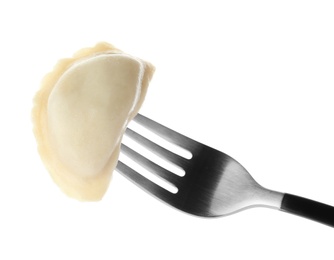 Fork with tasty dumpling isolated on white