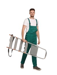 Photo of Worker in uniform holding metal ladder on white background