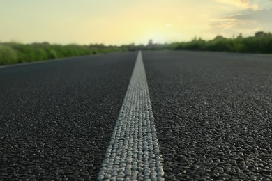 View of asphalt road on sunny day, closeup