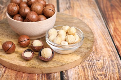 Delicious organic Macadamia nuts on wooden table