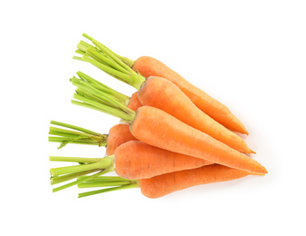 Pile of fresh ripe carrots isolated on white, top view
