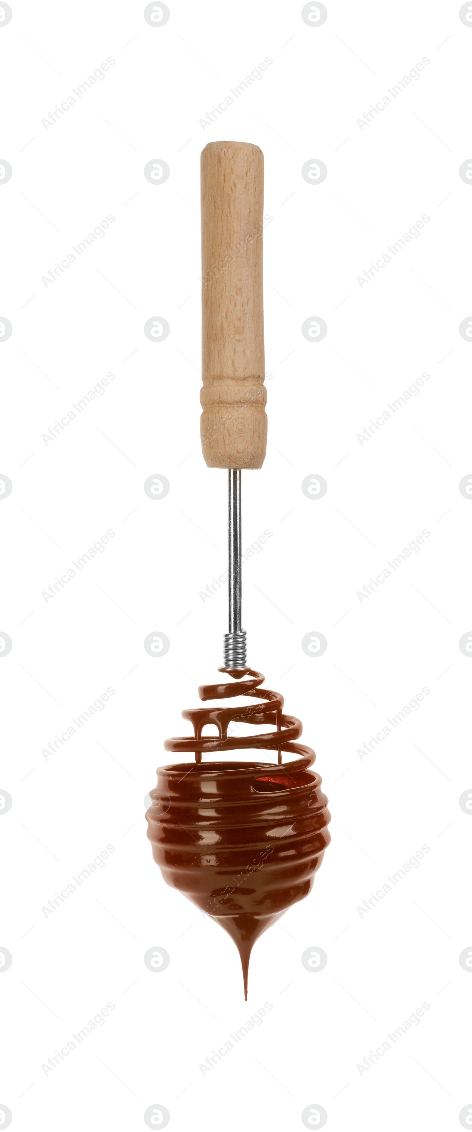 Photo of Chocolate cream flowing from whisk on white background